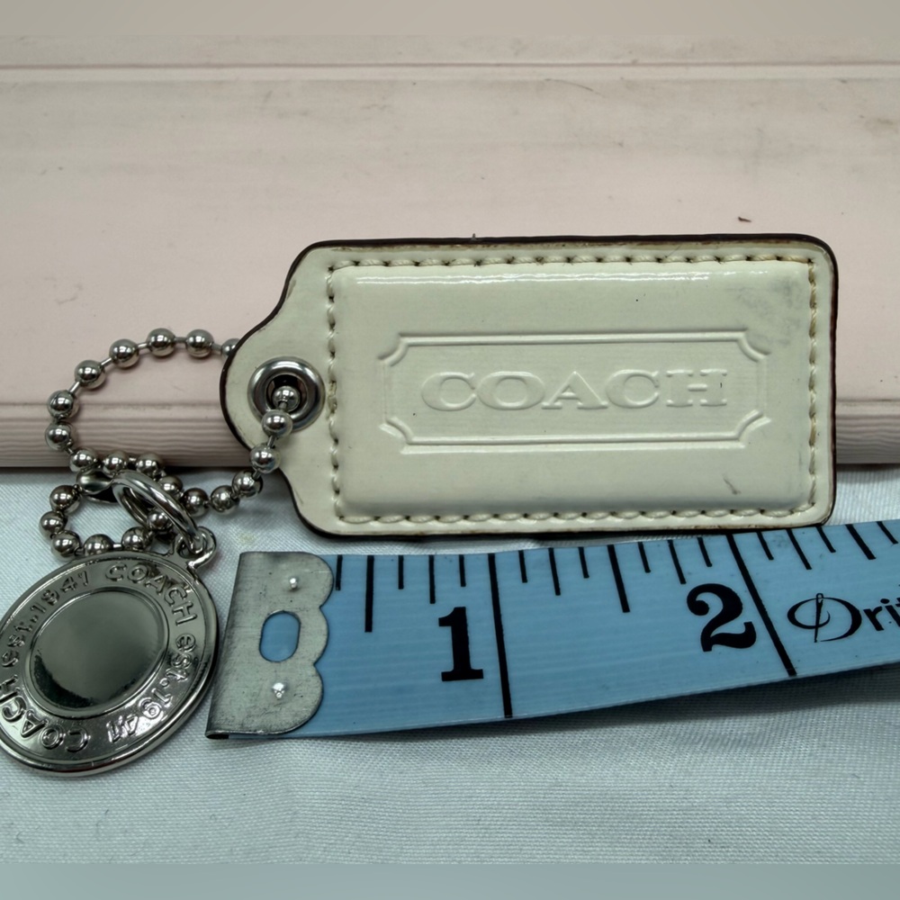 COACH Leather Hang Tag with Silver Tone Metal Button Charm Key Fob on Ball Chain